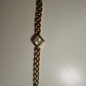 Vintage 1977 caravelle by Bulova ladies gold tone watch| diamond accent